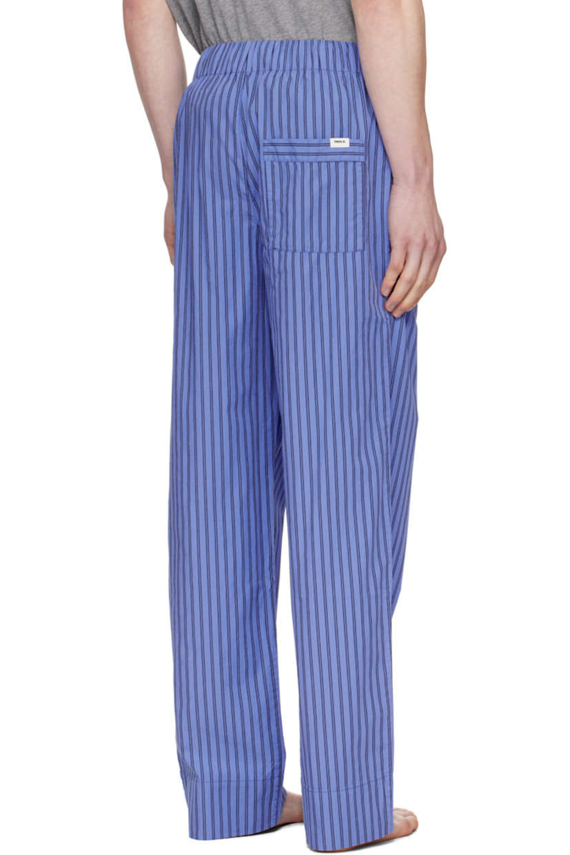 Lightweight organic cotton poplin pyjama pants. Stripes throughout.

· Certified OEKO-TEX® Standard 100
· Straight-leg and loose-fit 
· Stonewashed
· Drawstring at elasticized waistband
· Three-pocket styling
· Button fly
· Logo patch at back pocket
· French seams at interior
· Mother-of-pearl hardware

Supplier color: Boro stripes