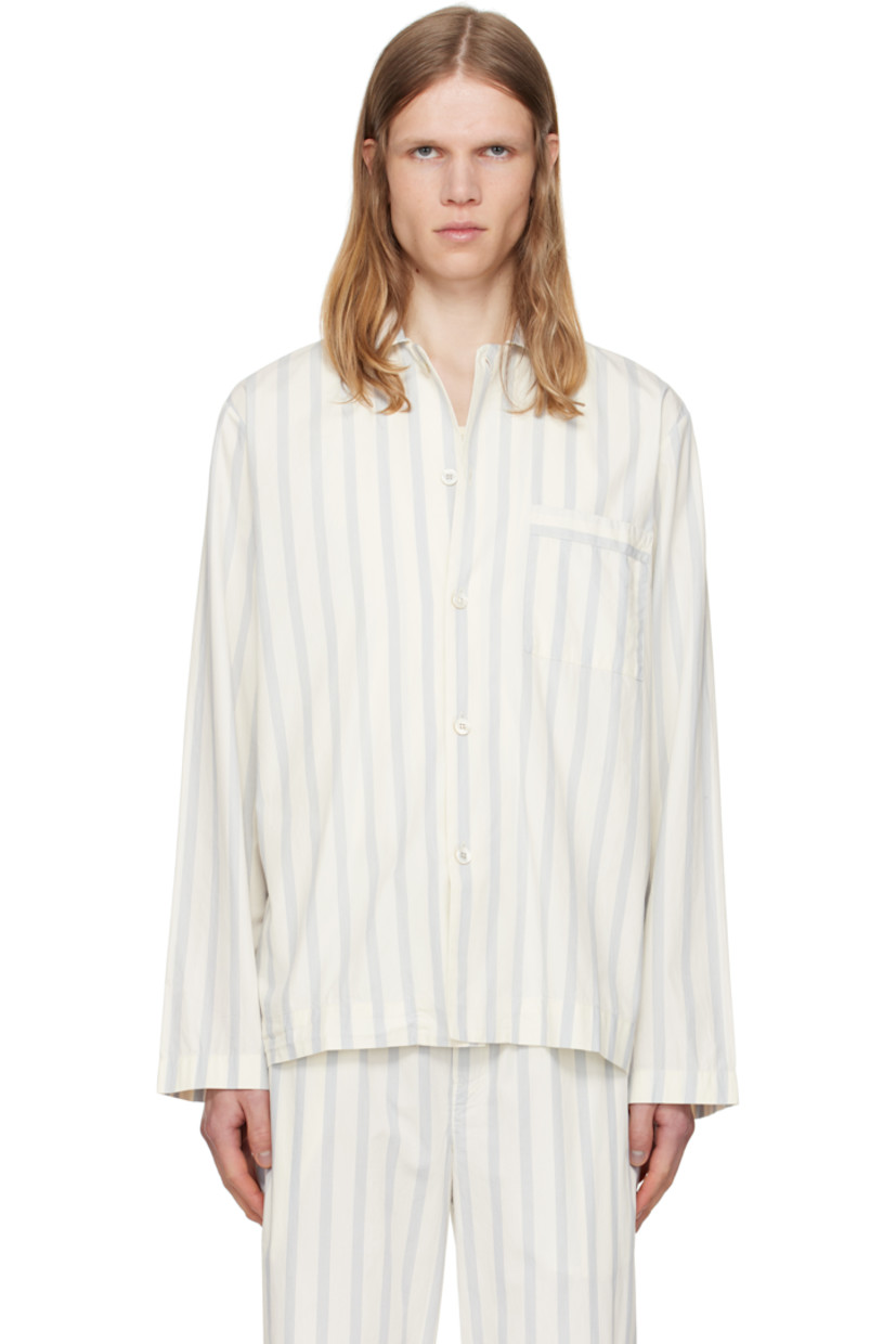 Lightweight organic cotton poplin pyjama shirt. Stripes throughout.

· Certified OEKO-TEX Standard 100
· Stonewashed
· Spread collar
· Button closure
· Patch pocket at chest
· French seams at interior
· Mother-of-pearl hardware

Supplier color: Needle stripes
