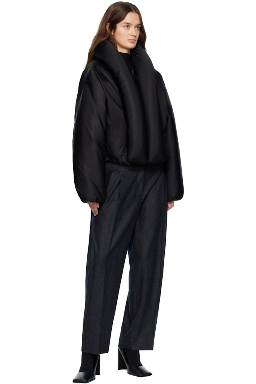 Insulated stretch nylon taffeta bomber jacket.

· Rolled shawl collar 
· Zip closure 
· Seam pockets at waist
· Elasticized hem and cuffs
· Dropped shoulders
· Full plain-woven lining 

Supplier color: Black