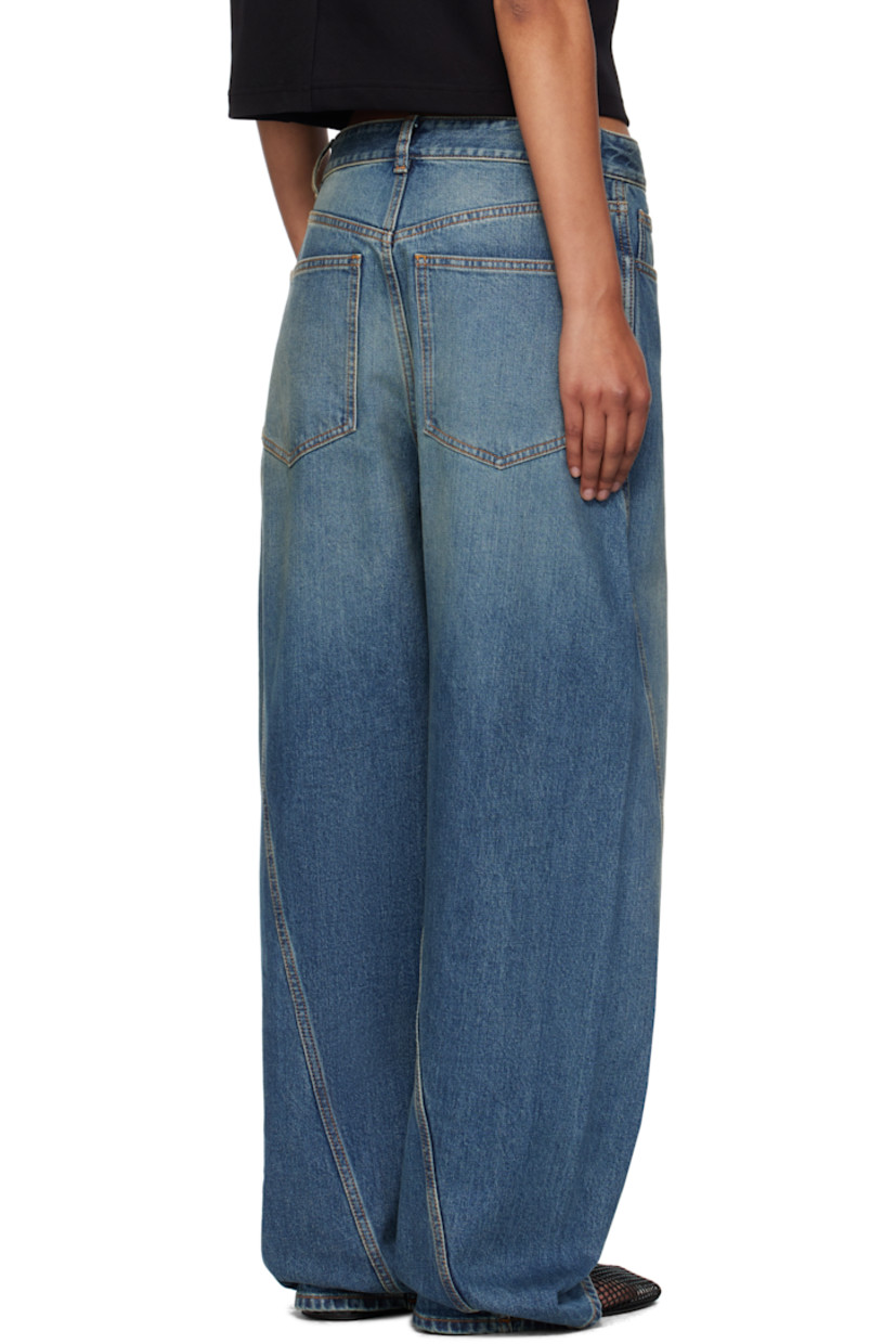 Stretch denim jeans.

· Fading throughout
· Straight-leg
· Mid-rise
· Belt loops
· Five-pocket styling
· Zip fly
· Twisted inseams and outseams
· Logo-engraved silver-tone hardware
· Contrast stitching in orange

Supplier color: Mineral