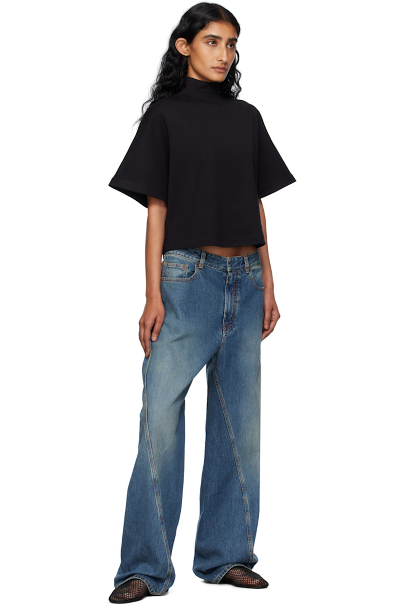 Stretch denim jeans.

· Fading throughout
· Straight-leg
· Mid-rise
· Belt loops
· Five-pocket styling
· Zip fly
· Twisted inseams and outseams
· Logo-engraved silver-tone hardware
· Contrast stitching in orange

Supplier color: Mineral