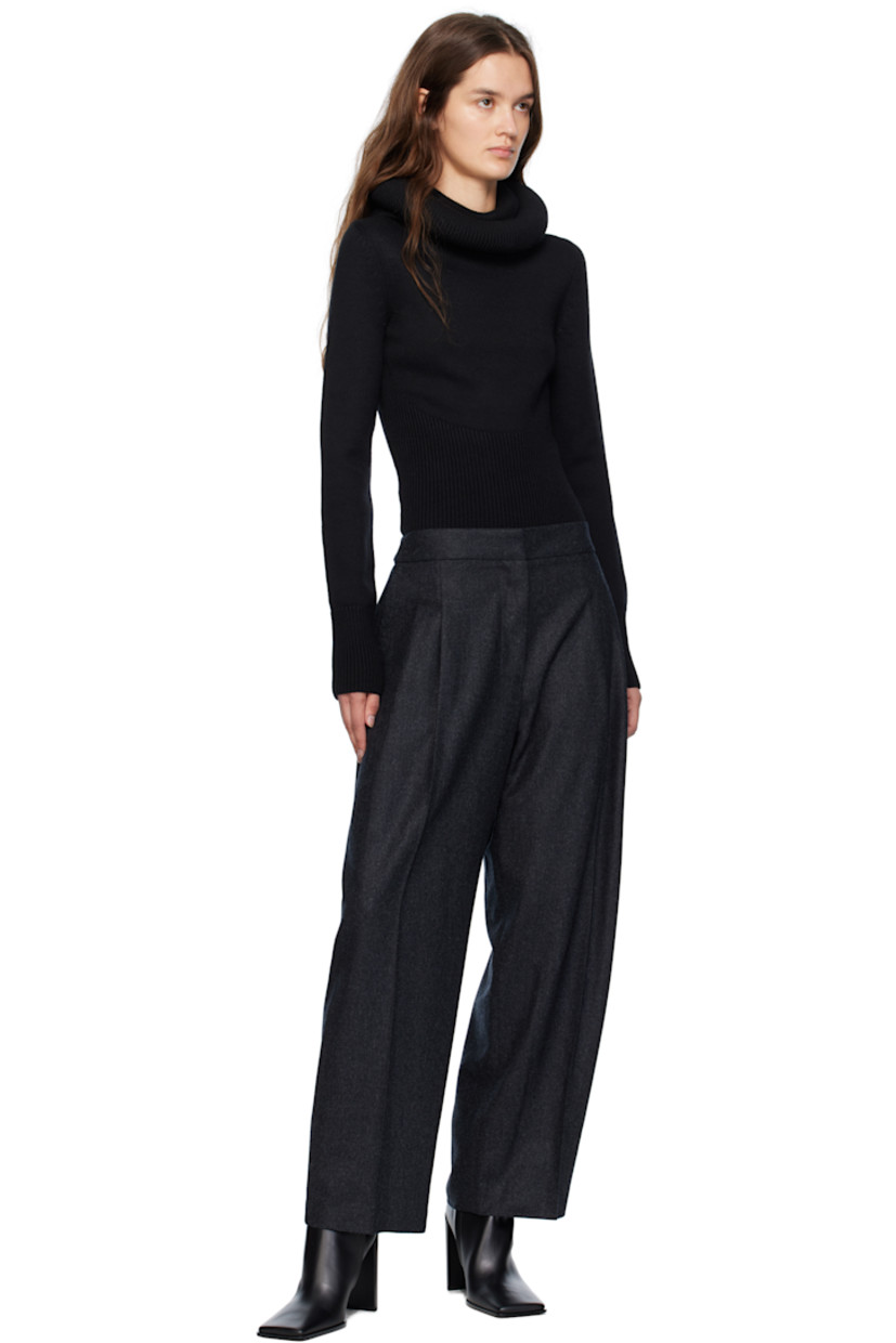 Tapered wool flannel trousers.

· Low-rise 
· Button tabs at waistband
· Four-pocket styling
· Zip fly 
· Pleats at front 
· Creased legs

Supplier color: Anthracite