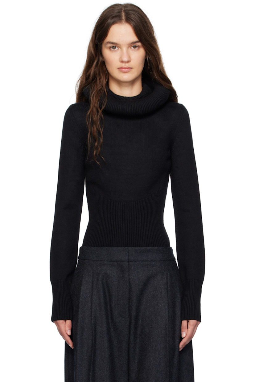 Rib-knit wool turtleneck. Padded and rolled collar converts to hood.

Supplier color: Black