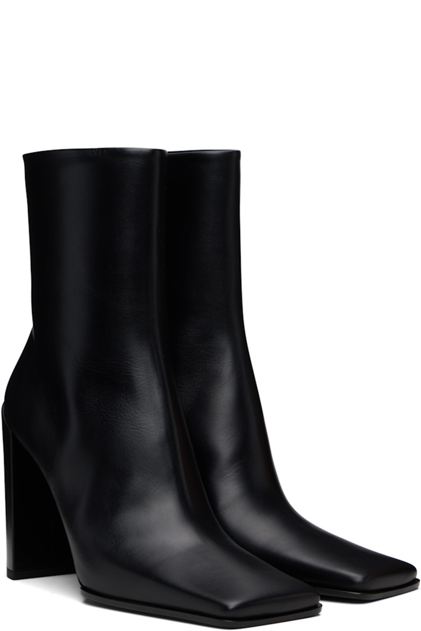 Ankle-high buffed calfskin boots. 

· Square toe
· Zip closure at inner side
· Buffed leather lining
· Covered block heel with rubber injection
· Leather sole with rubber injection
· Heel: H4"

Supplier color: Noir