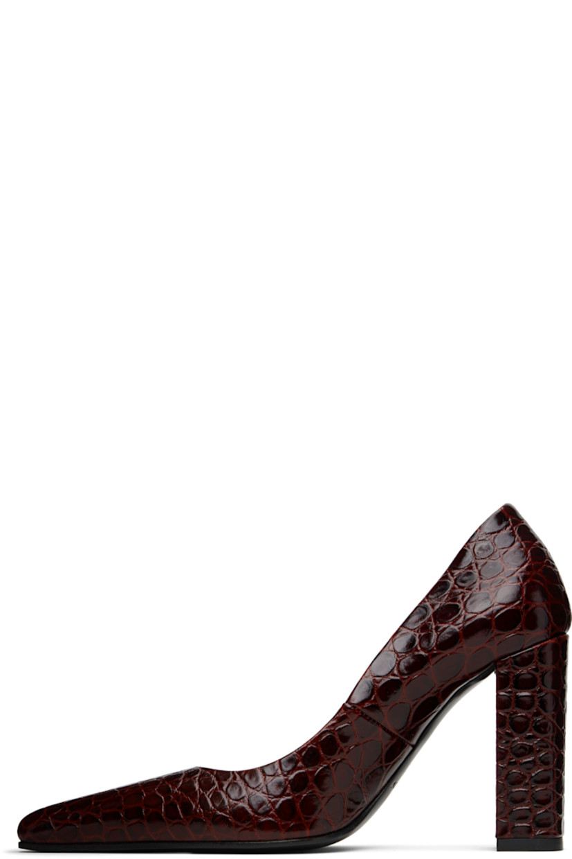 Croc-embossed calfskin heels. 

· Pointed toe
· Buffed leather lining
· Covered block heel with rubber injection
· Leather sole with rubber injection
· Heel: H3.5"

Supplier color: Rouge grenat