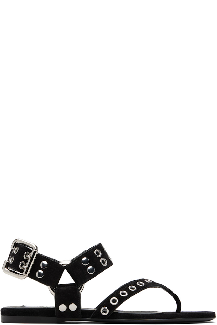 Calfskin suede flat sandals. 

· Grommets throughout
· Thong-style strap at vamp 
· Adjustable pin-buckle slingback strap
· Calfskin lining 
· Calfskin sole with rubber injection 

Supplier color: Noir
