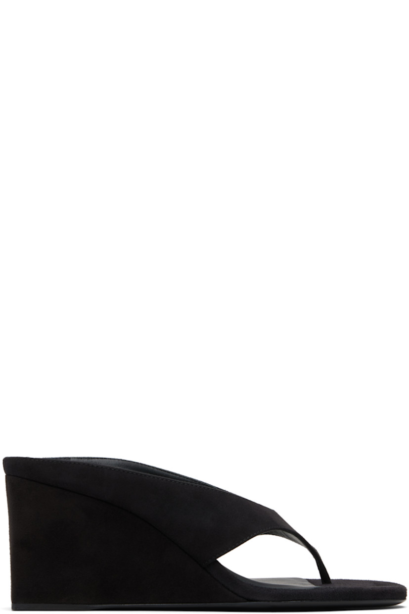 Goatskin suede heeled sandals.

· Open toe 
· Thong-style strap at vamp
· Lambskin lining
· Covered wedge heels with rubber injection
· Calfskin sole 
· Heel: H3"

Supplier color: Black