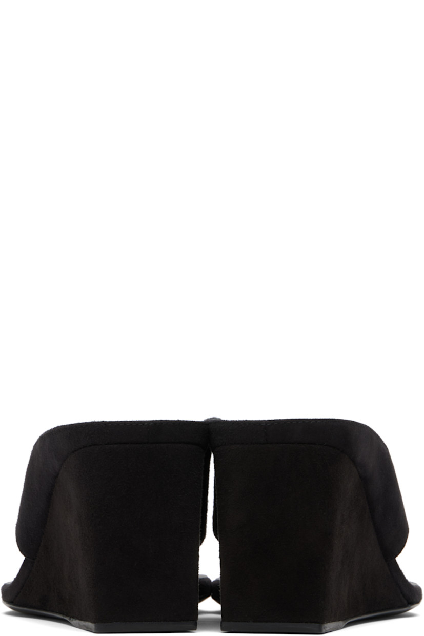 Goatskin suede heeled sandals.

· Open toe 
· Thong-style strap at vamp
· Lambskin lining
· Covered wedge heels with rubber injection
· Calfskin sole 
· Heel: H3"

Supplier color: Black