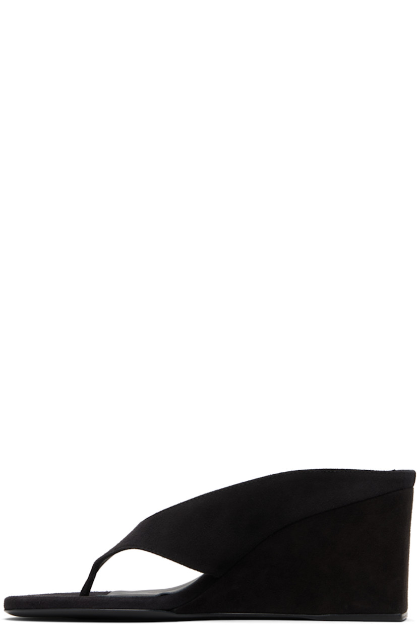 Goatskin suede heeled sandals.

· Open toe 
· Thong-style strap at vamp
· Lambskin lining
· Covered wedge heels with rubber injection
· Calfskin sole 
· Heel: H3"

Supplier color: Black