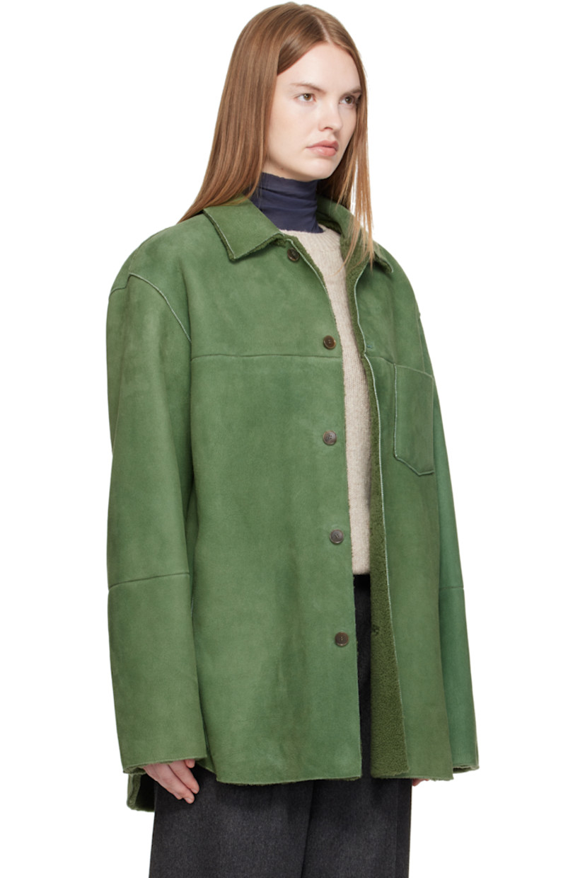 Paneled lambskin suede jacket.

· Exposed seams throughout
· Spread collar
· Button closure
· Patch pocket at chest
· Seam pockets at waist
· Shearling interior

Supplier color: Dusty green