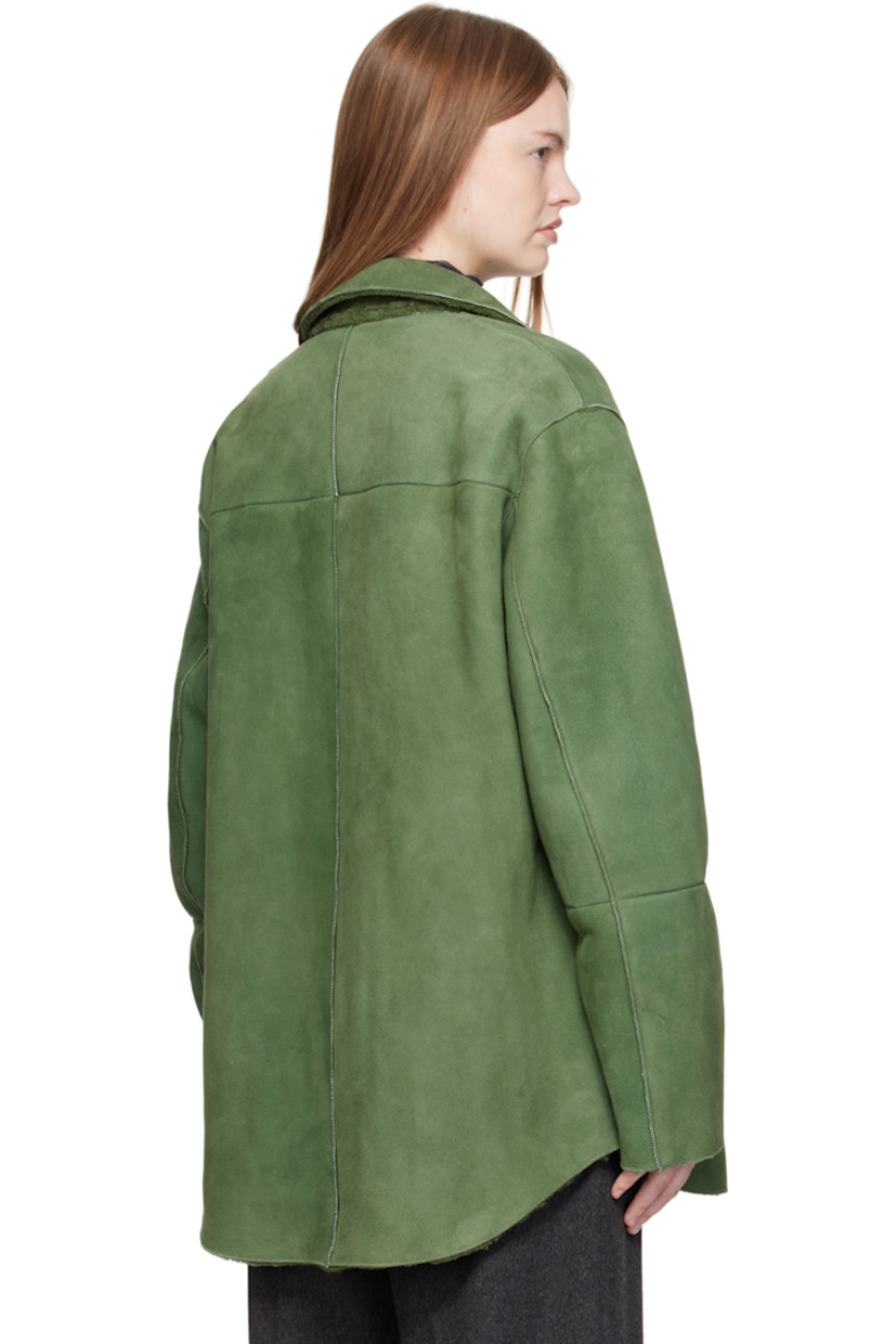 Paneled lambskin suede jacket.

· Exposed seams throughout
· Spread collar
· Button closure
· Patch pocket at chest
· Seam pockets at waist
· Shearling interior

Supplier color: Dusty green