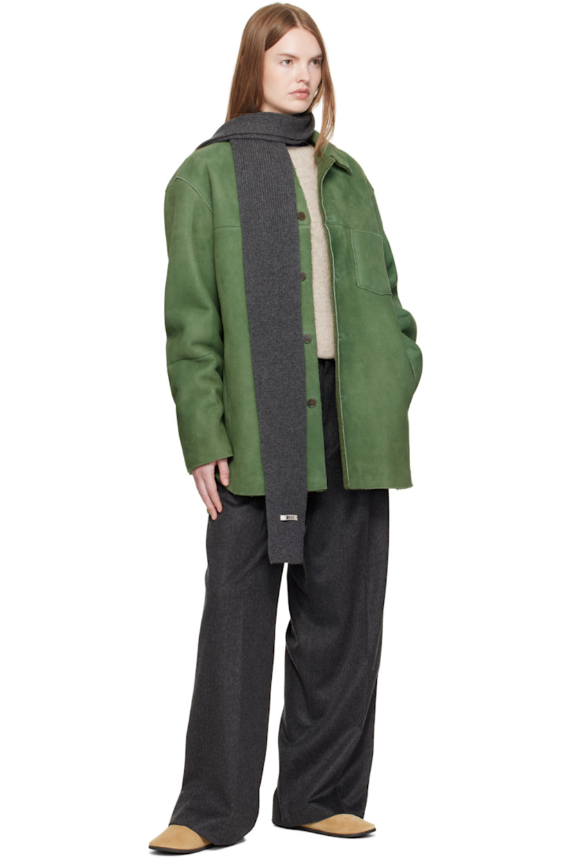 Paneled lambskin suede jacket.

· Exposed seams throughout
· Spread collar
· Button closure
· Patch pocket at chest
· Seam pockets at waist
· Shearling interior

Supplier color: Dusty green
