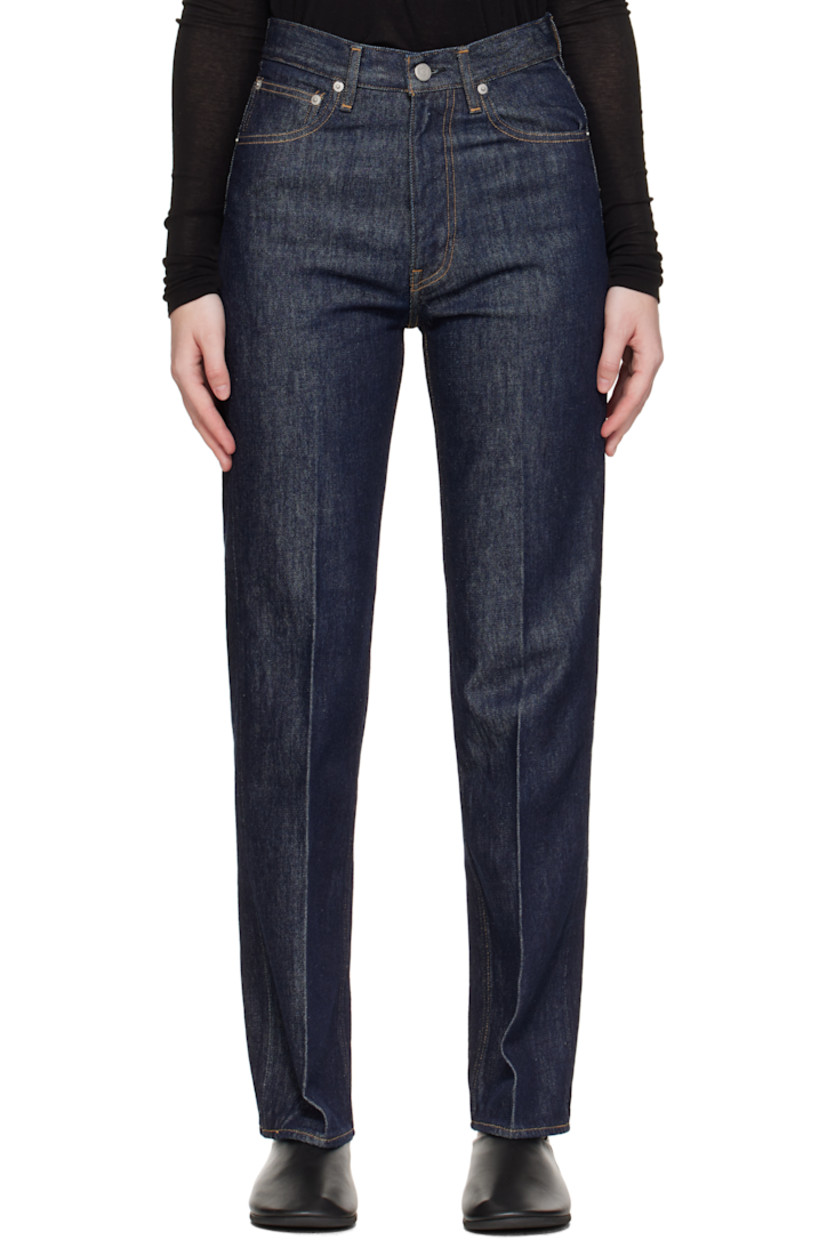 Indigo rope-dyed non-stretch denim jeans.

· Slim-fit, straight-leg
· Belt loops
· Five-pocket styling
· Zip fly
· Creased legs
· Logo-engraved silver-tone hardware
· Contrast stitching in tan

Supplier color: Indigo