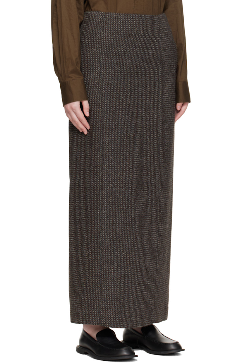 Lightweight wool- and alpaca-blend tweed maxi skirt.

· Paneled construction
· Two-pocket styling
· Zip closure at back waist
· Central vent at back hem
· Full satin lining
· Silver-tone hardware

Supplier color: Gray brown hairline