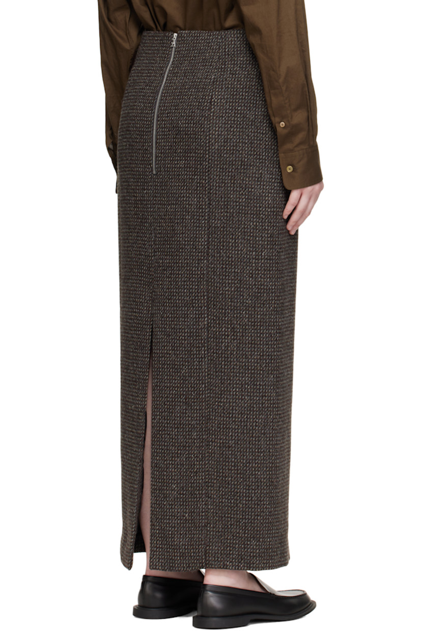 Lightweight wool- and alpaca-blend tweed maxi skirt.

· Paneled construction
· Two-pocket styling
· Zip closure at back waist
· Central vent at back hem
· Full satin lining
· Silver-tone hardware

Supplier color: Gray brown hairline