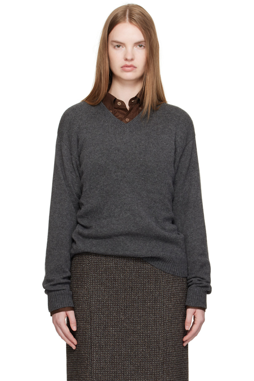 Lightweight knit cashmere sweater.

· Rib-knit V-neck, hem, and cuffs
· Dropped shoulders

Supplier color: Charcoal