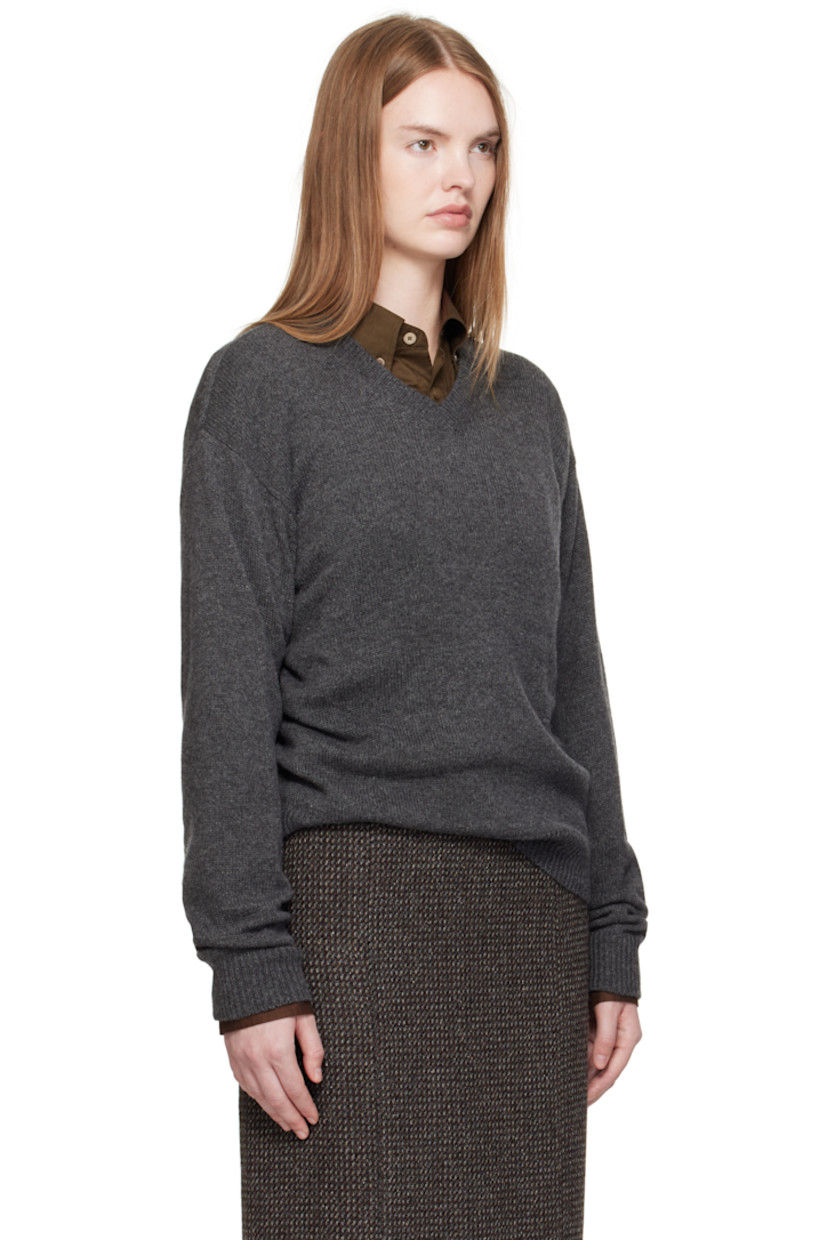 Lightweight knit cashmere sweater.

· Rib-knit V-neck, hem, and cuffs
· Dropped shoulders

Supplier color: Charcoal