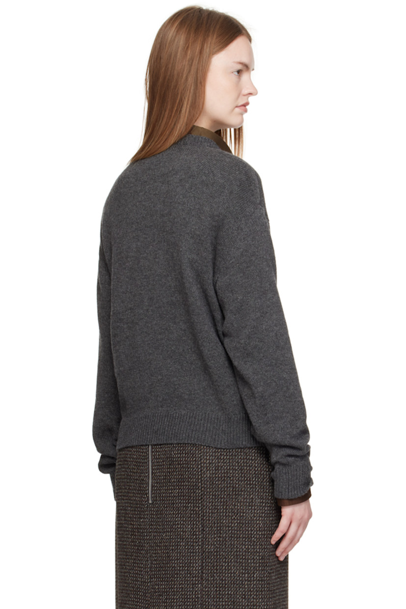 Lightweight knit cashmere sweater.

· Rib-knit V-neck, hem, and cuffs
· Dropped shoulders

Supplier color: Charcoal