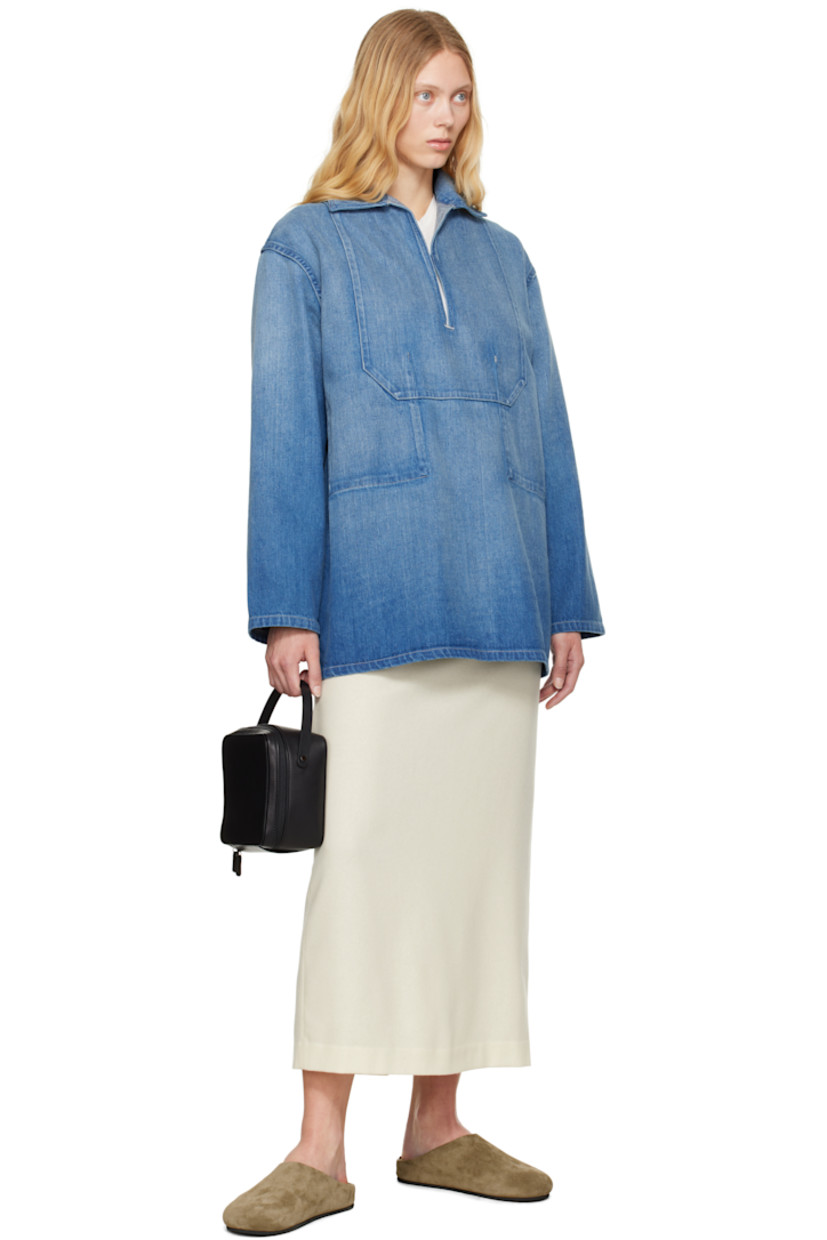 Non-stretch denim shirt. Fading throughout.

· Paneled construction 
· Spread collar
· Button fastening at open placket

Supplier color: Light indigo
