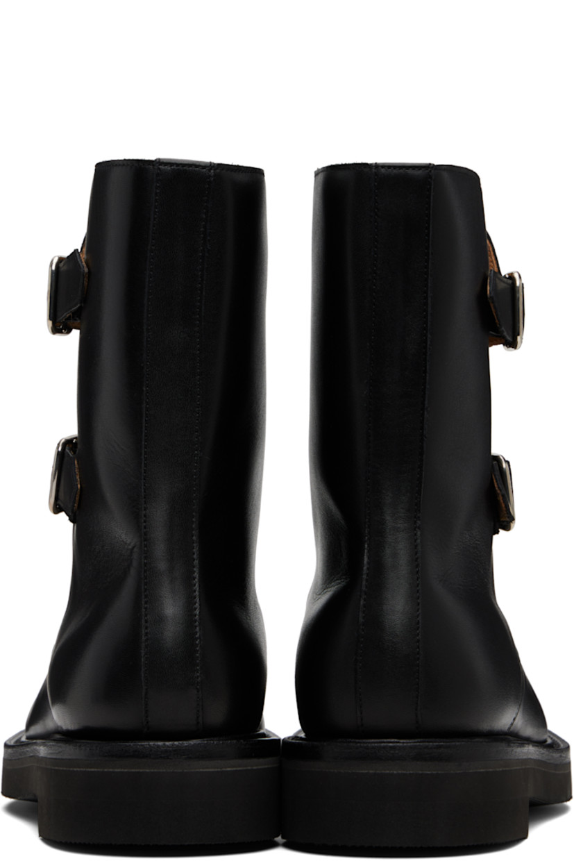 Mid-calf buffed calfskin boots.

· Pin-buckle tabs at outer side 
· Buffed calfskin lining
· Textured rubber sole 

Supplier color: Black
