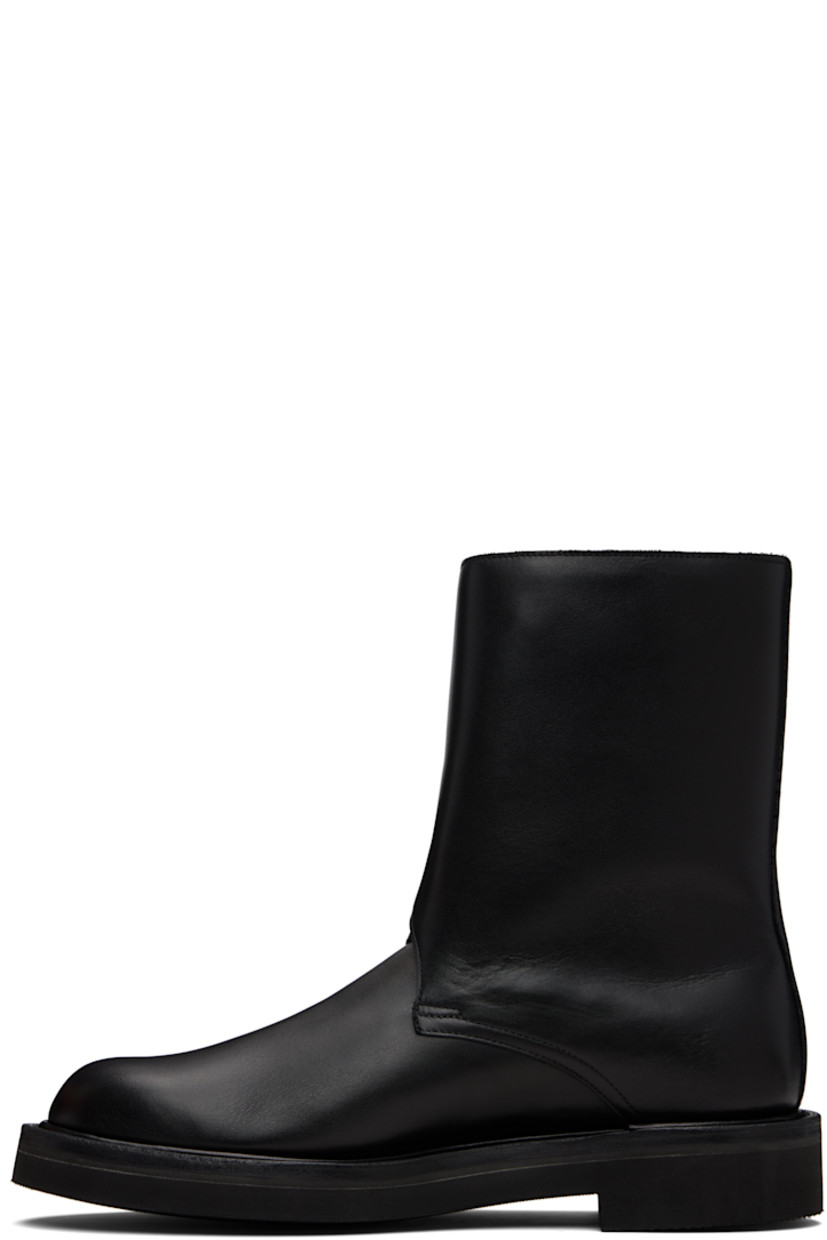 Mid-calf buffed calfskin boots.

· Pin-buckle tabs at outer side 
· Buffed calfskin lining
· Textured rubber sole 

Supplier color: Black