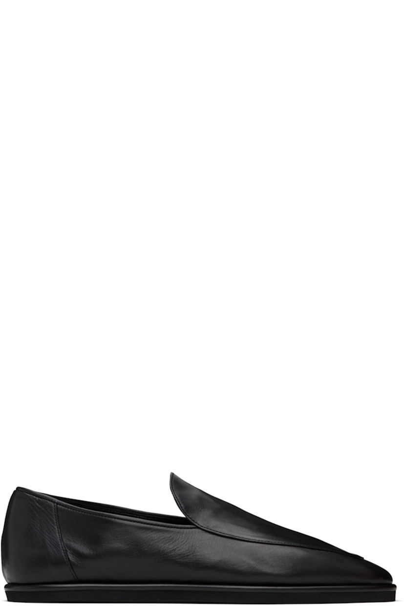 Handcrafted grained calfskin slip-on loafers.

· Buffed calfskin lining
· Textured rubber sole

Supplier color: Black