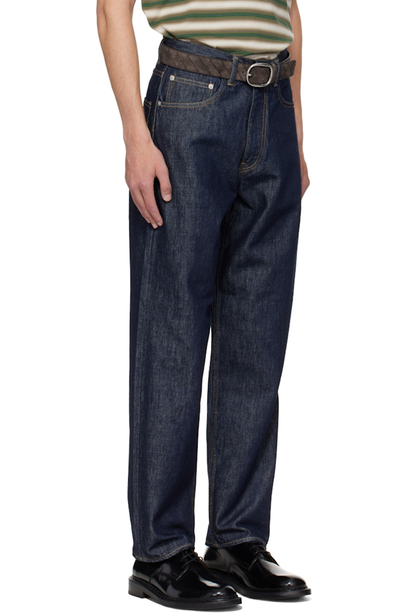 Indigo rope-dyed non-stretch denim jeans.

· Tapered, wide-leg
· Belt loops
· Five-pocket styling
· Zip fly
· Logo-engraved silver-tone hardware
· Contrast stitching in tan

Supplier color: Indigo