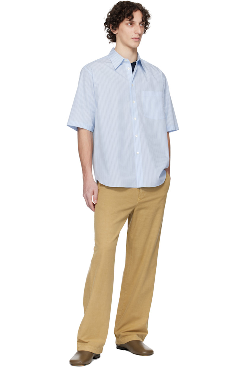 Suvin cotton broadcloth shirt. Stripes throughout.

· Spread collar
· Button closure
· Patch pocket at chest
· Shirttail hem

Supplier color: Light blue stripe
