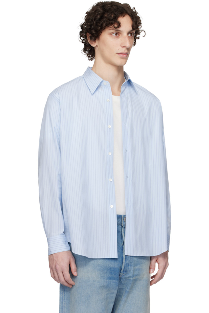 Suvin cotton broadcloth shirt. Stripes throughout.

· Spread collar
· Button closure
· Shirttail hem
· Buttoned barrel cuffs
· Pleats at back yoke

Supplier color: Light blue stripe