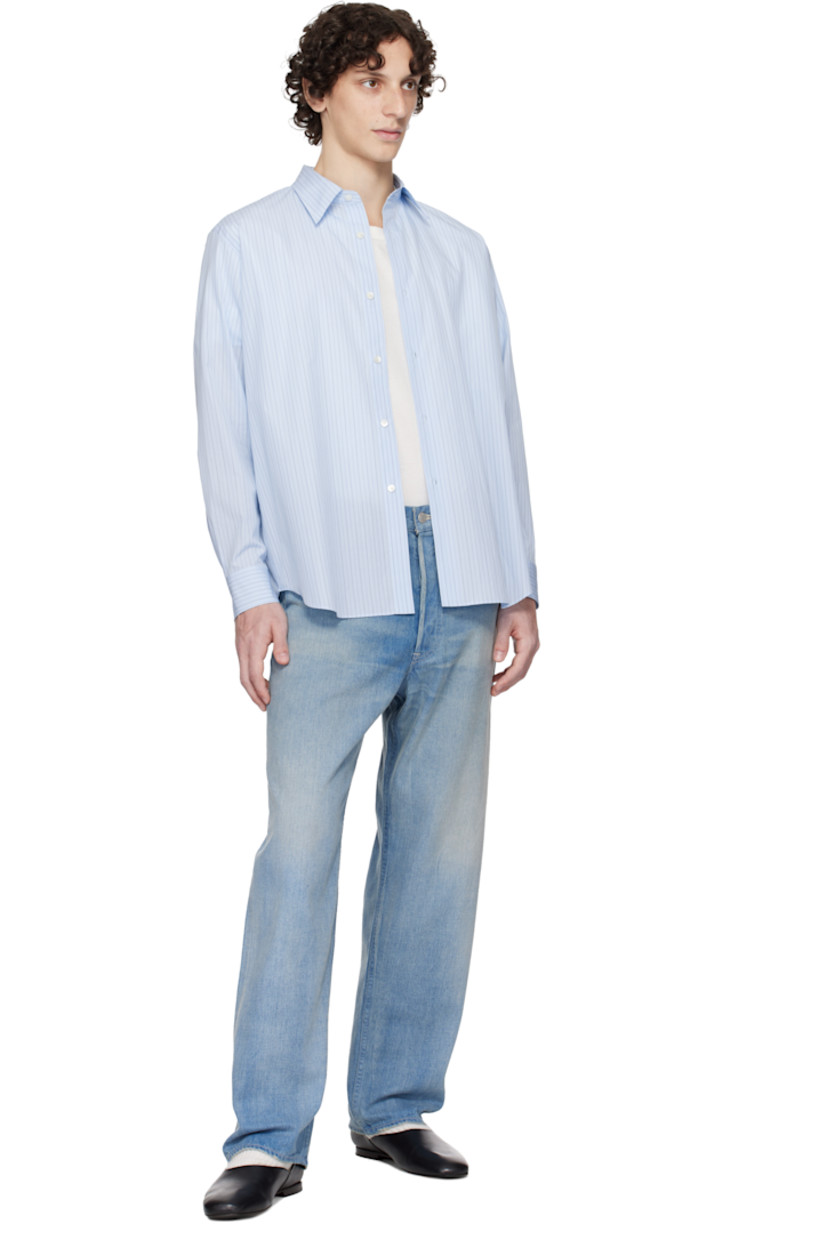 Suvin cotton broadcloth shirt. Stripes throughout.

· Spread collar
· Button closure
· Shirttail hem
· Buttoned barrel cuffs
· Pleats at back yoke

Supplier color: Light blue stripe