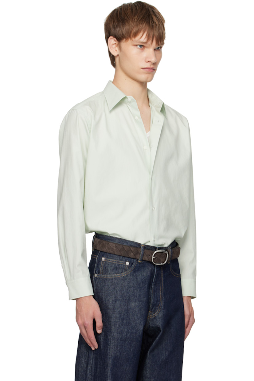 Washed extra-long staple Finx cotton twill shirt.

· Spread collar
· Button closure
· Shirttail hem
· Buttoned barrel cuffs
· Twin pleats at back yoke
· Mother-of-pearl hardware

Supplier color: Light khaki