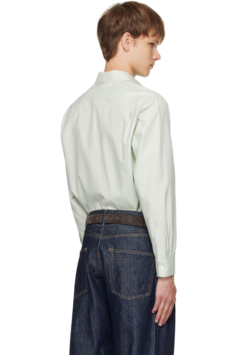 Washed extra-long staple Finx cotton twill shirt.

· Spread collar
· Button closure
· Shirttail hem
· Buttoned barrel cuffs
· Twin pleats at back yoke
· Mother-of-pearl hardware

Supplier color: Light khaki