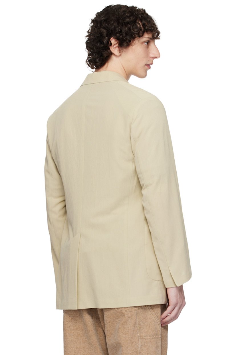 Lightweight extra-long staple cotton- and wool-blend gabardine blazer.

· Notched lapel
· Button closure
· Patch pockets
· Vented cuffs
· Central vent at back hem
· Patch pocket at interior
· Unlined

Supplier color: Light khaki