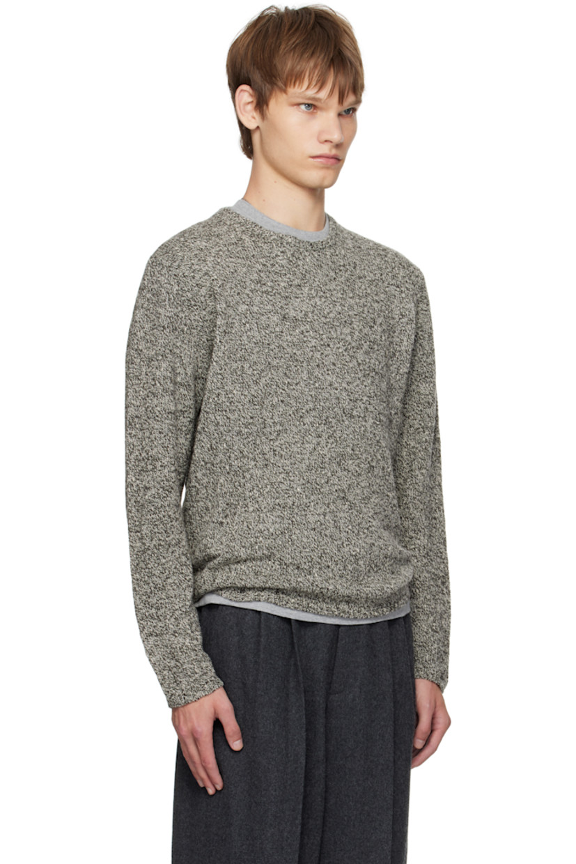 Knit wool- and silk-blend sweater.

· Lightweight
· Marling throughout
· Rib-knit crewneck, hem, and cuffs

Supplier color: Top black