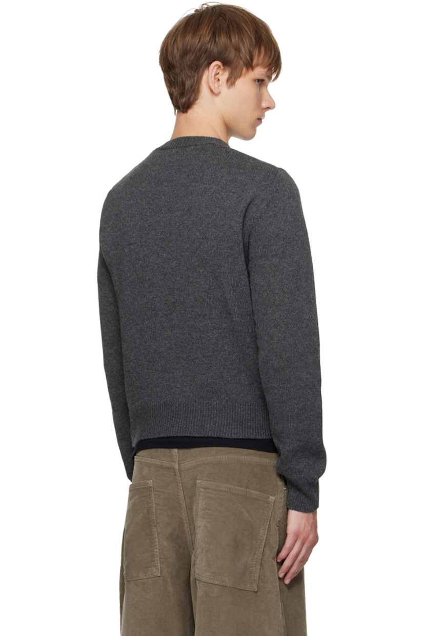 Lightweight knit cashmere sweater. Rib-knit crewneck, hem, and cuffs.

Supplier color: Charcoal