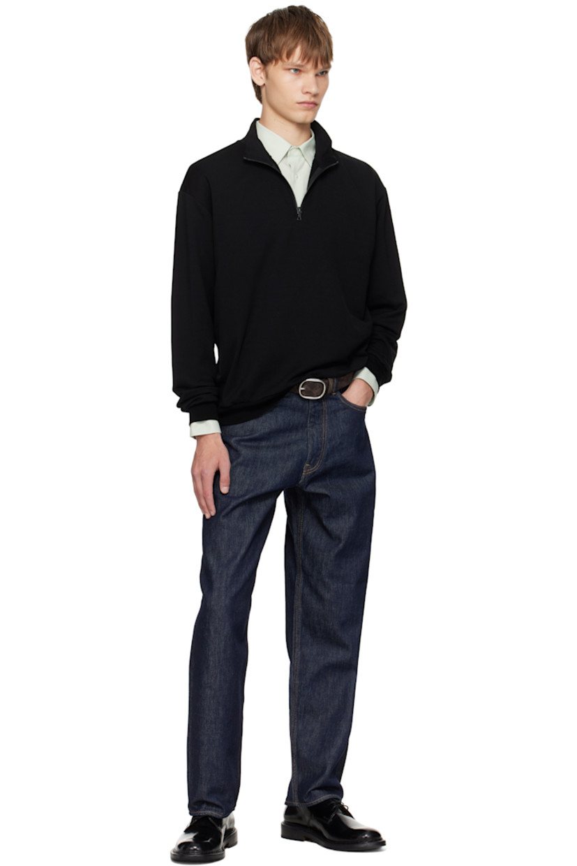 Lightweight wool-blend fleece sweatshirt.

· Stand collar
· Half-zip closure
· Rib-knit hem and cuffs

Supplier color: Black