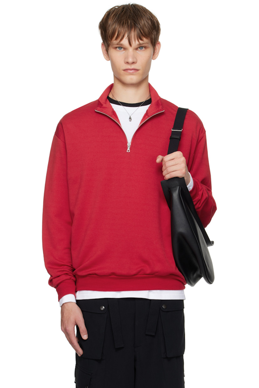 Lightweight wool-blend fleece sweatshirt.

· Stand collar
· Half-zip closure
· Rib-knit hem and cuffs

Supplier color: Red