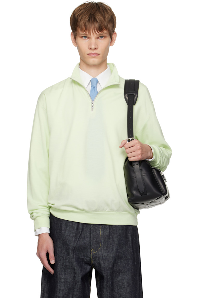 Lightweight wool-blend fleece sweatshirt.

· Stand collar
· Half-zip closure
· Rib-knit hem and cuffs

Supplier color: Pale lime