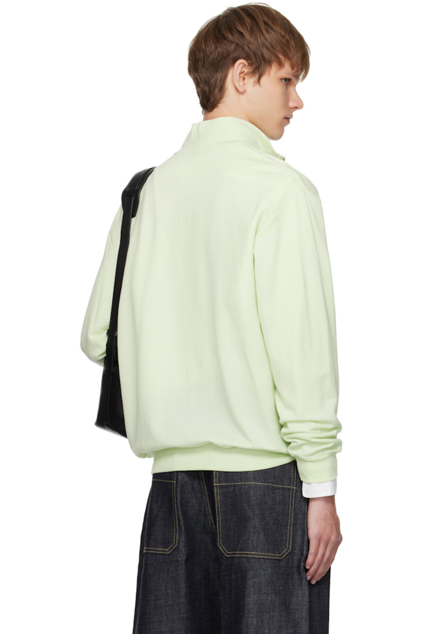 Lightweight wool-blend fleece sweatshirt.

· Stand collar
· Half-zip closure
· Rib-knit hem and cuffs

Supplier color: Pale lime