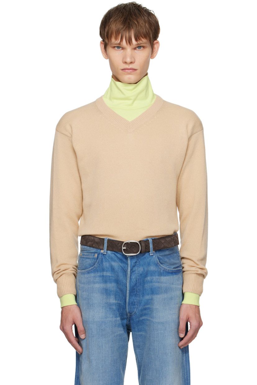 Lightweight knit cashmere sweater.

· Rib-knit V-neck, hem, and cuffs
· Dropped shoulders

Supplier color: Beige