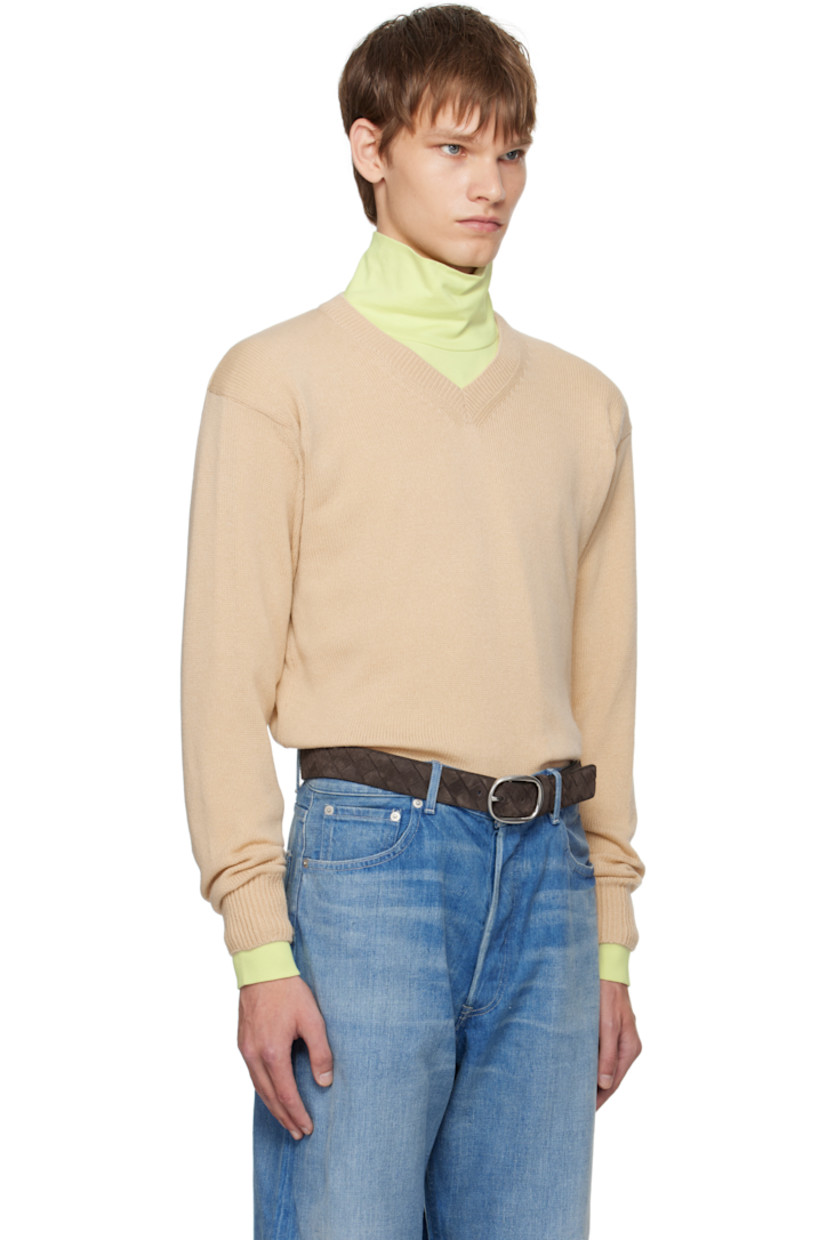 Lightweight knit cashmere sweater.

· Rib-knit V-neck, hem, and cuffs
· Dropped shoulders

Supplier color: Beige