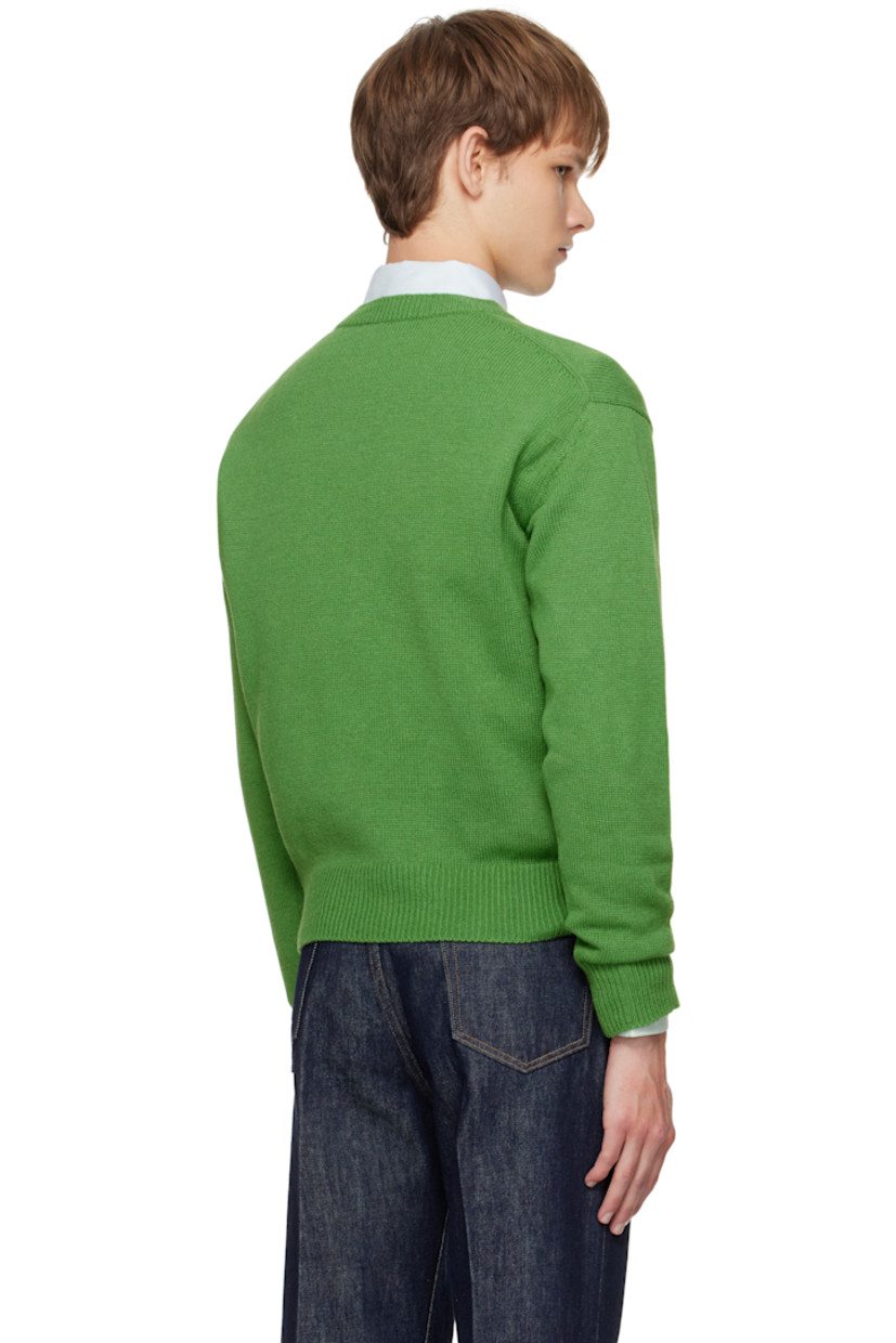 Lightweight knit cashmere sweater.

· Rib-knit V-neck, hem, and cuffs
· Dropped shoulders

Supplier color: Green