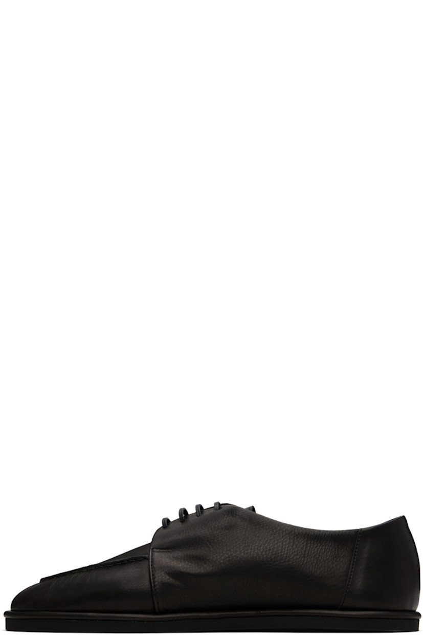 Grained calfskin oxfords.

· Moc toe
· Lace-up closure
· Treaded rubber sole

Supplier color: Black