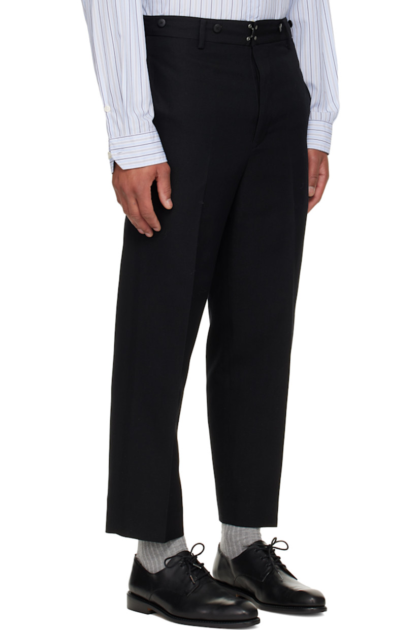 Wool-blend twill trousers.

· Belt loops
· Four-pocket styling
· Button fly
· Creased legs
· Cinch strap at back
· Partial satin lining

Supplier color: Black
