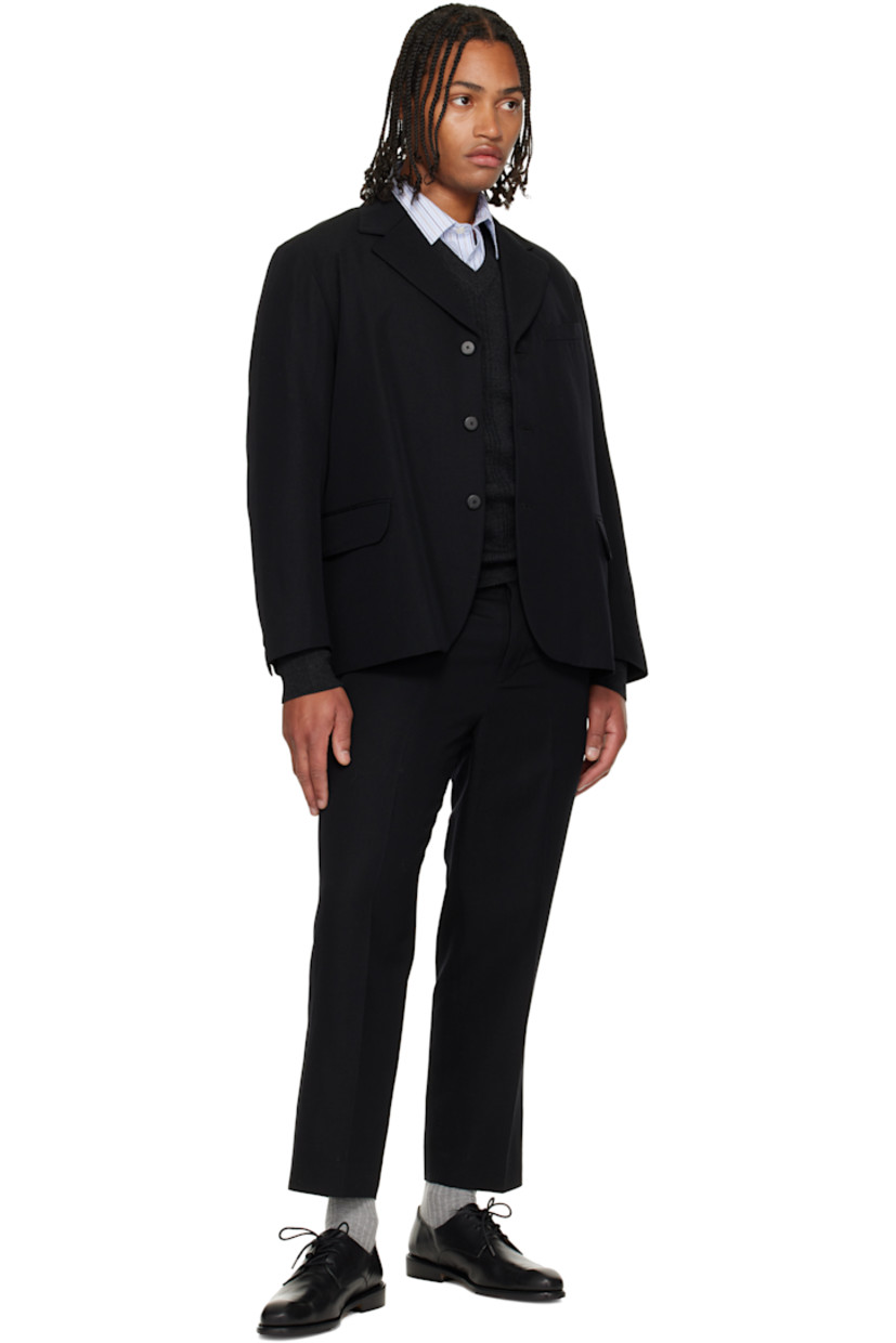Wool-blend twill trousers.

· Belt loops
· Four-pocket styling
· Button fly
· Creased legs
· Cinch strap at back
· Partial satin lining

Supplier color: Black