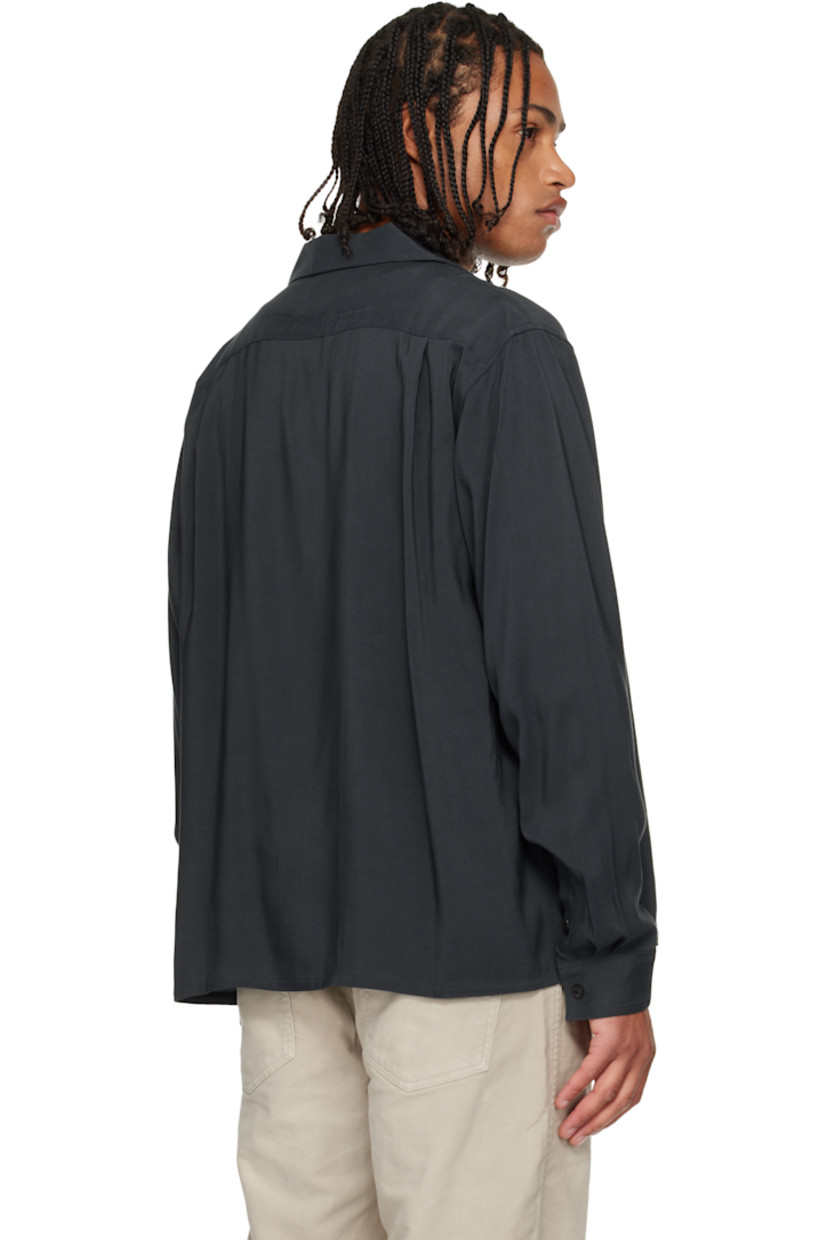 Rayon twill shirt. 

· Open spread collar
· Button closure
· Patch pocket at chest
· Buttoned barrel cuffs

Supplier color: Black