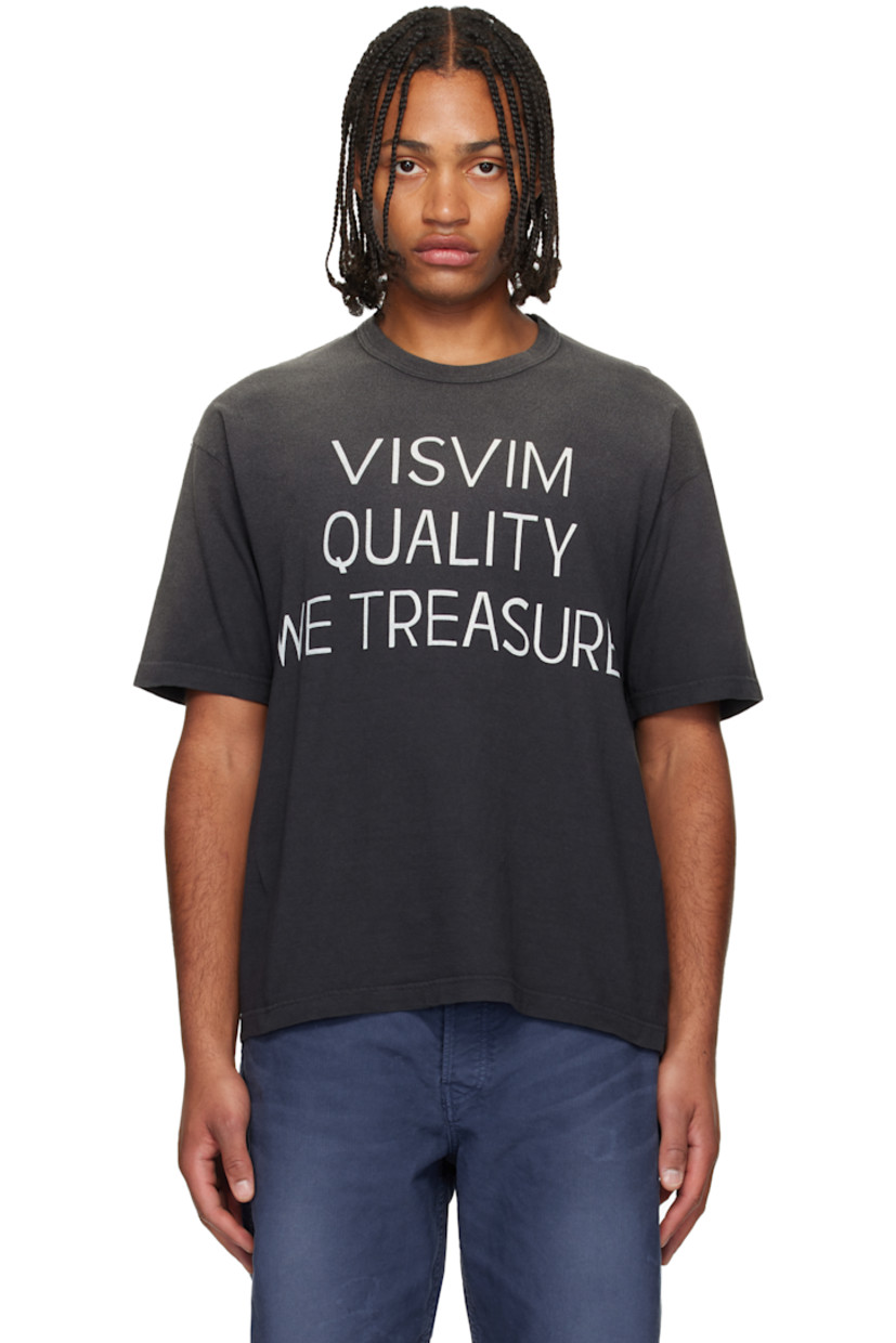 Cotton jersey T-shirt. 

· Fading throughout 
· Rib-knit crewneck
· Patch pocket at chest
· Dropped shoulders
· Contrast stitching in white at back collar 

Supplier color: Black