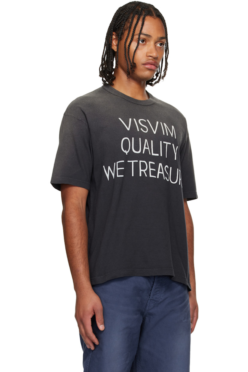 Cotton jersey T-shirt. 

· Fading throughout 
· Rib-knit crewneck
· Patch pocket at chest
· Dropped shoulders
· Contrast stitching in white at back collar 

Supplier color: Black