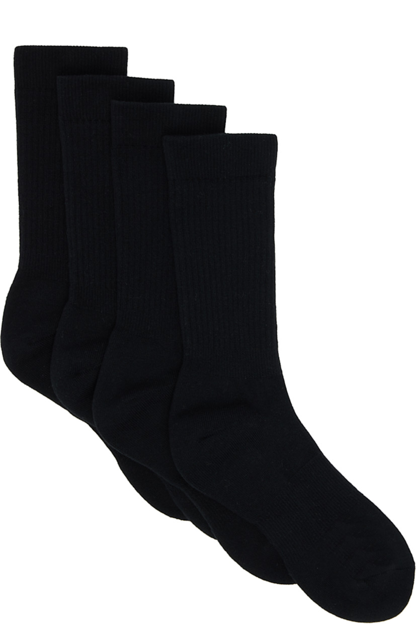 Two pairs of calf-high French terry socks.

· Rib-knit cuffs
· Logo patch at toe

Supplier color: Black