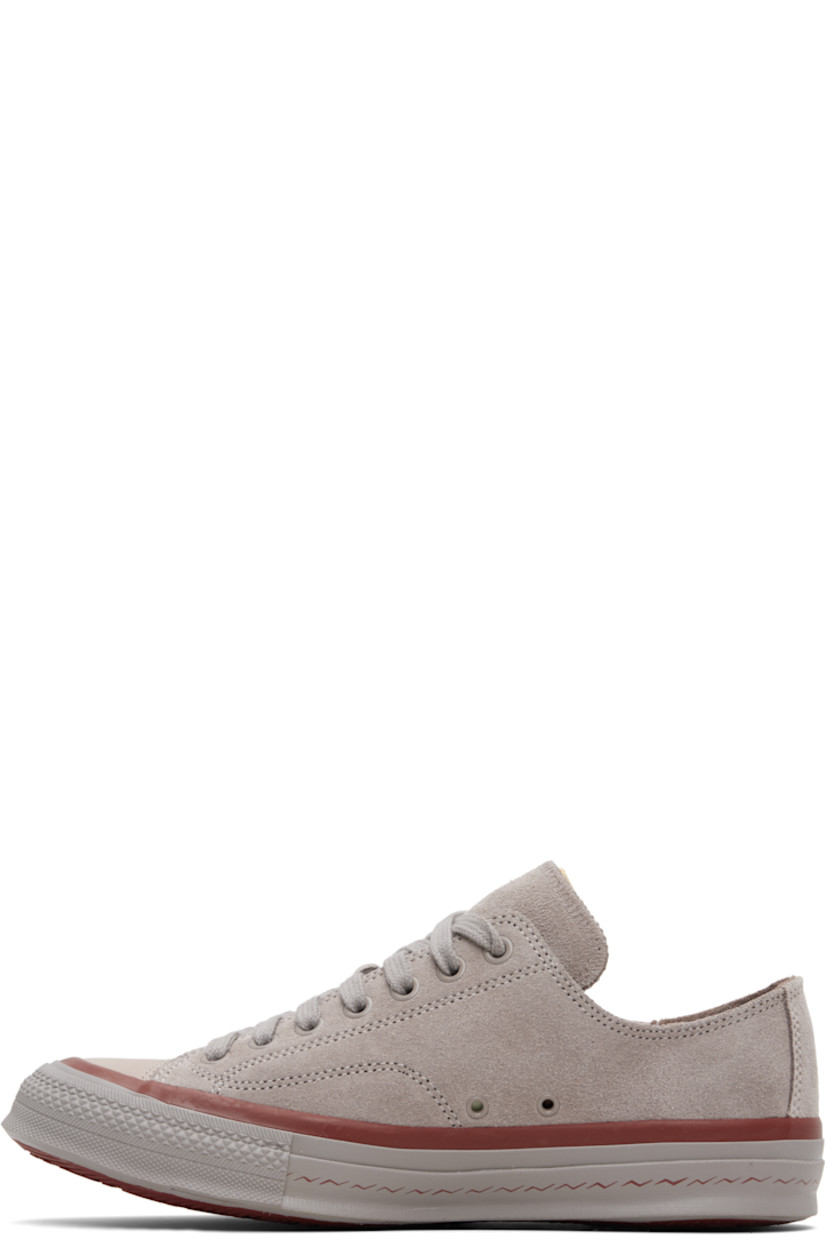 Low-top suede sneakers.

· Rubber cap toe 
· Lace-up closure
· Logo flag at tongue
· Grommets at inner side
· Rubber midsole 
· Rubber logo patch at outer midsole 
· Treaded Vibram® rubber sole

Supplier color: Grey